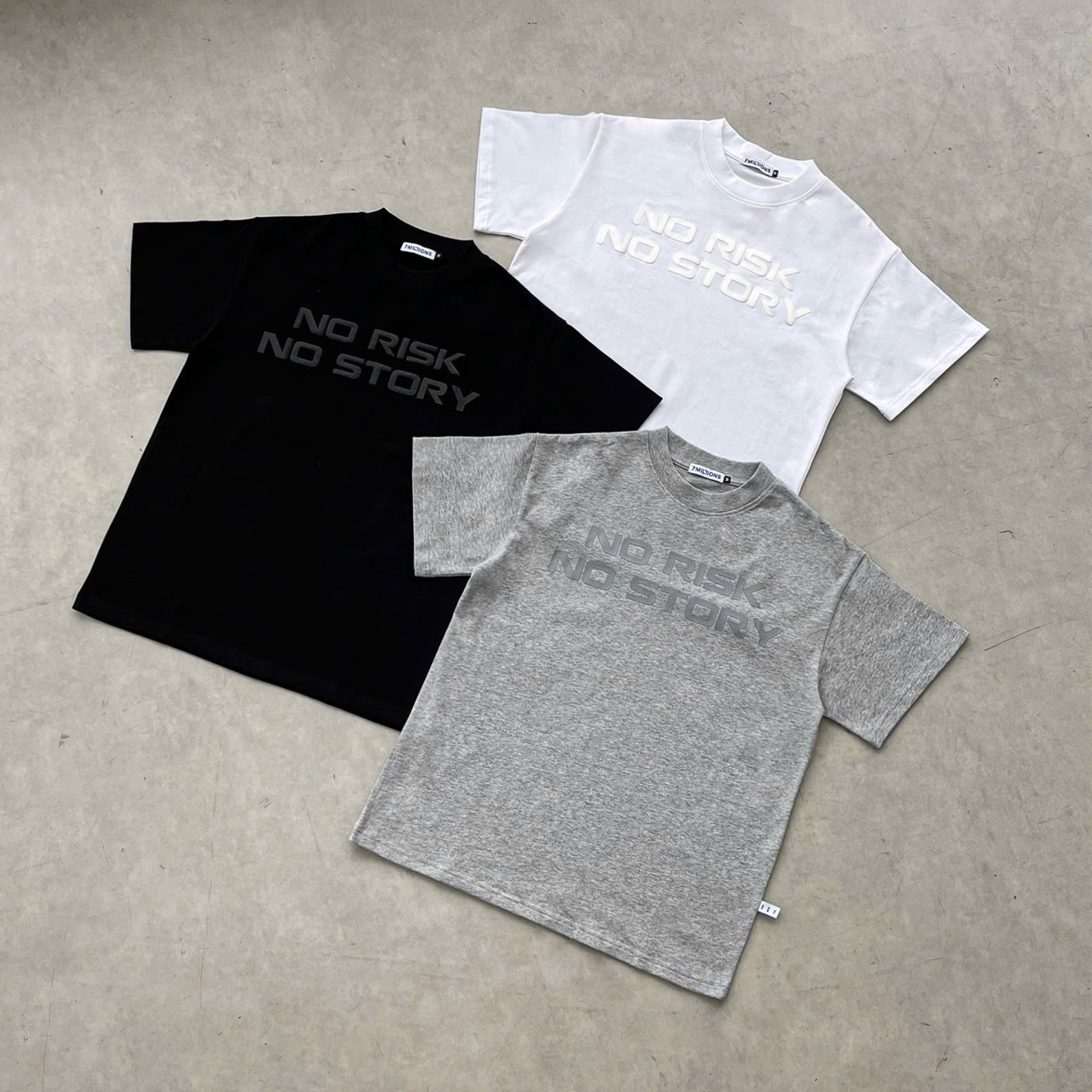 7 MILLIONS NO RISK NO STORY cotton T-shirts in black, white and heather grey